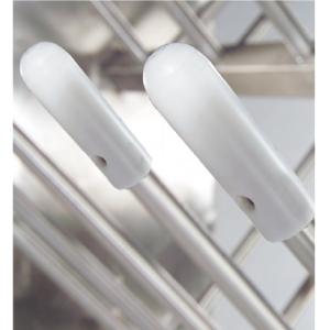 Balti gaisa vārsti ar ovālu formu, izgatavoti no plastmasas, piestiprināti pie metāla žāvētāja.