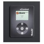 Melna kontrolierpults ar ekrānu un pogām, paredzēta apģērbu un apavu žāvēšanas skapjiem.